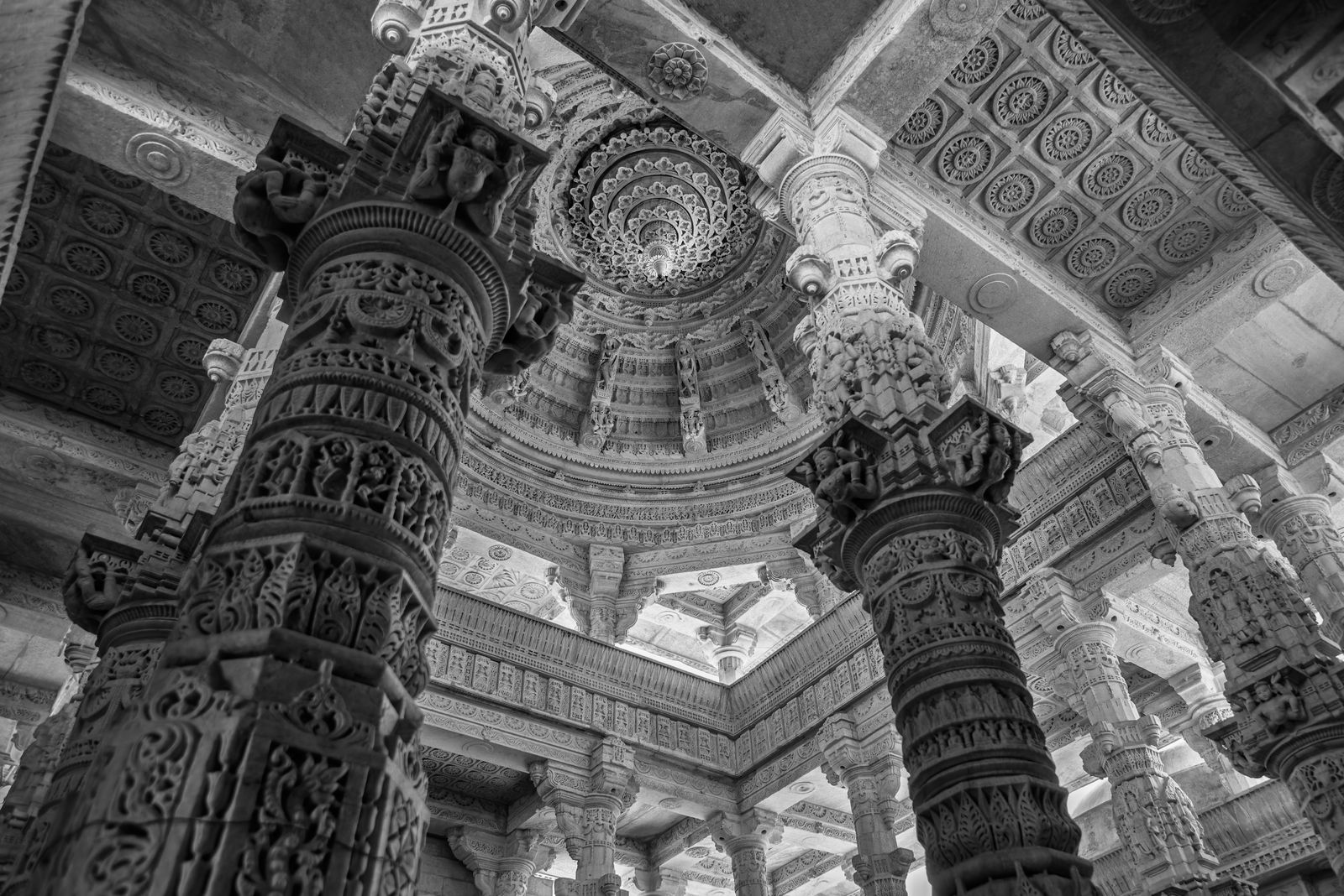 Carved marble pillars and dome inside the Ranakpur Jain temple