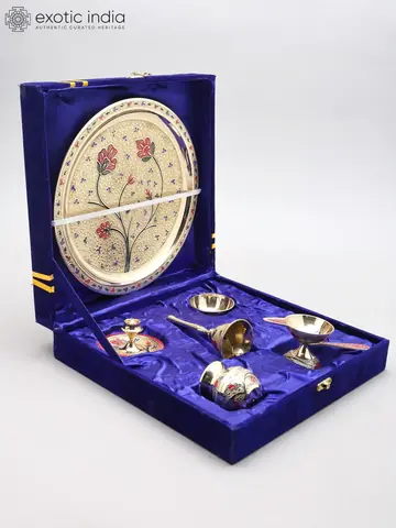 The set laid out with plate, bell and small pieces