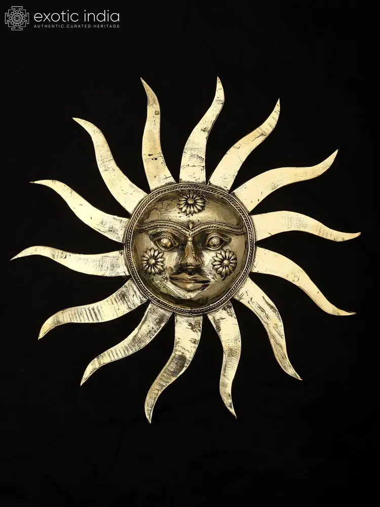 Brass Surya sun face with wavy rays on a black ground