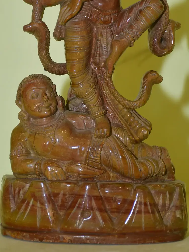 Close view of the lower figure and base