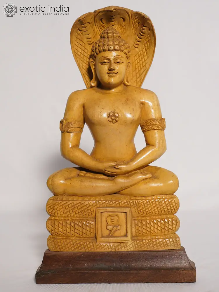 White wood Parshvanatha seated under a serpent hood, front view