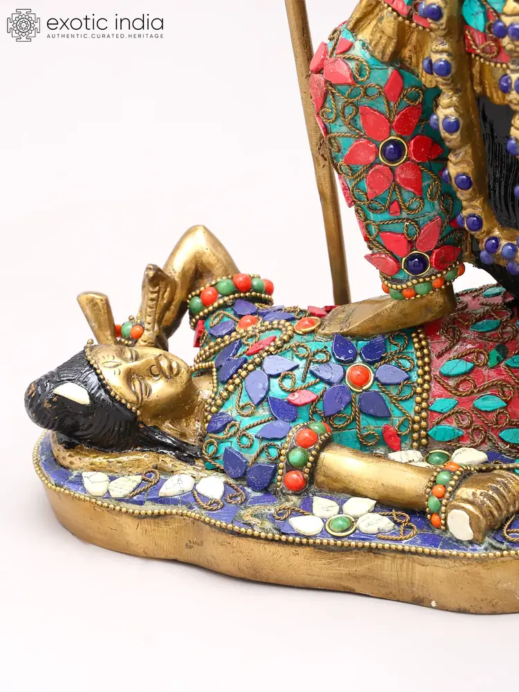 Close view of the base with the reclining figure