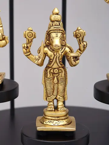 Close view of one brass avatar