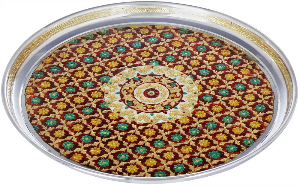 Large round puja thali with a patterned centre and silver rim