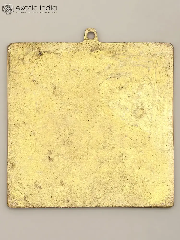 Plain brass back of the plate with its hanging loop