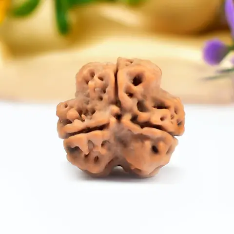 The bead turned to show its three faces
