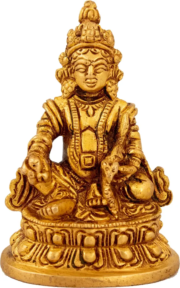 Seated Kubera in brass seen from the front