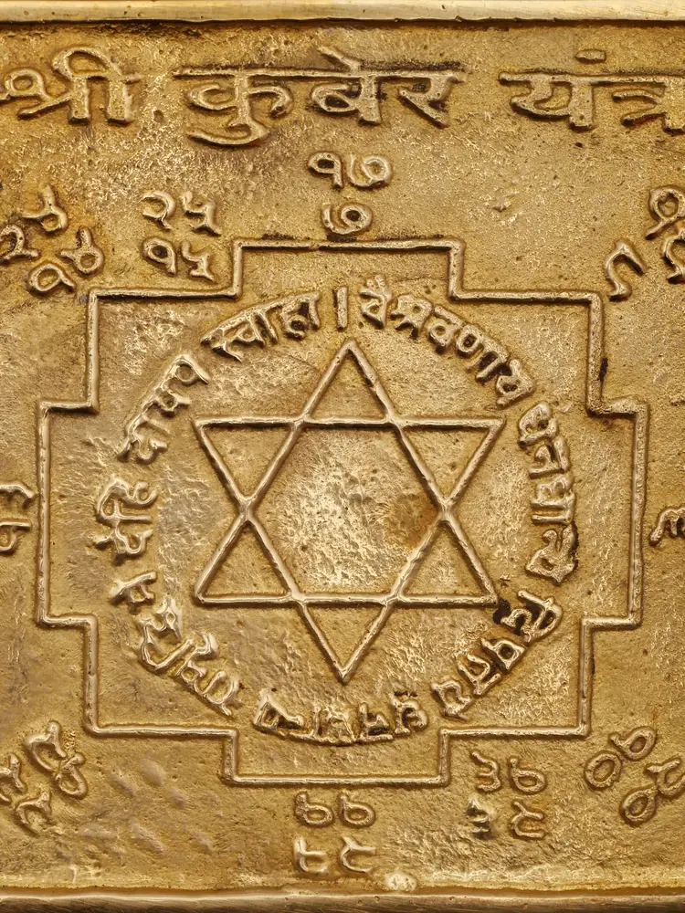 Detail of the engraved text and number squares