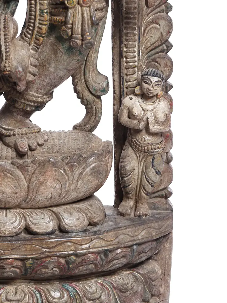 Close view of the lotus base and lower figure