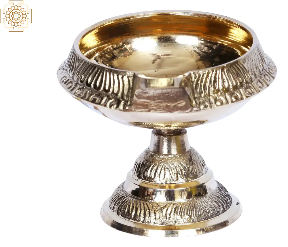 Footed brass lamp with engraved bands, front view