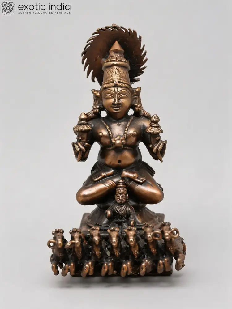 Copper Surya Dev idol seated above seven horses