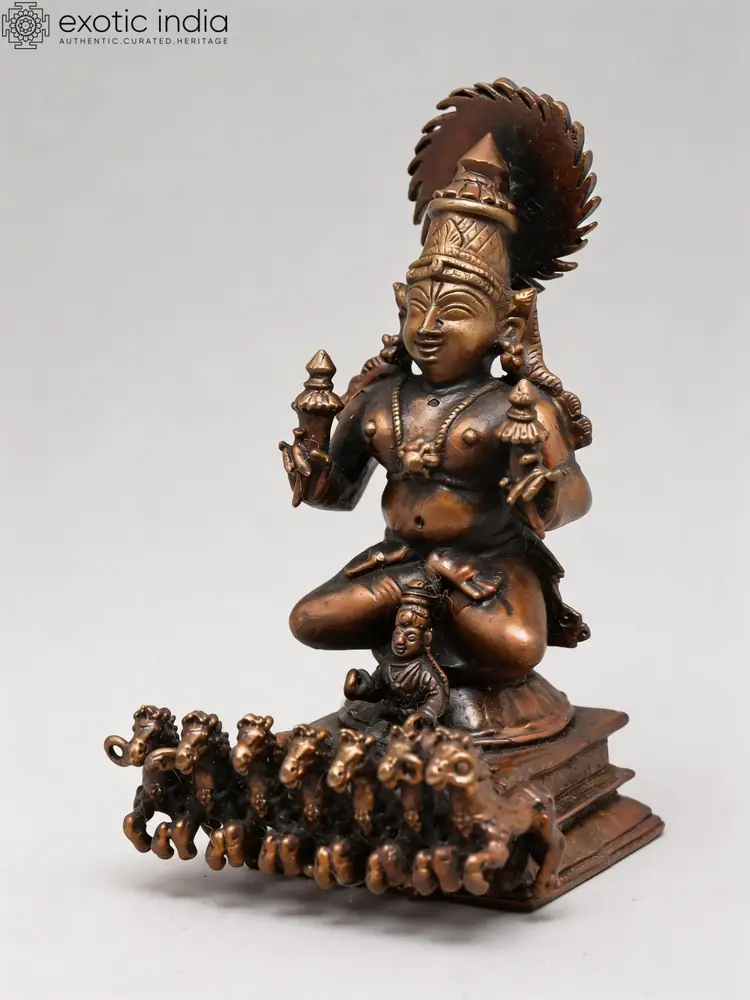 The idol from a slight angle showing the horses