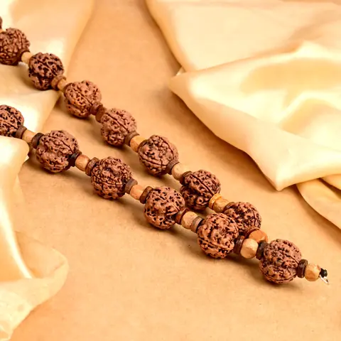 The mala stretched out to show the alternating beads
