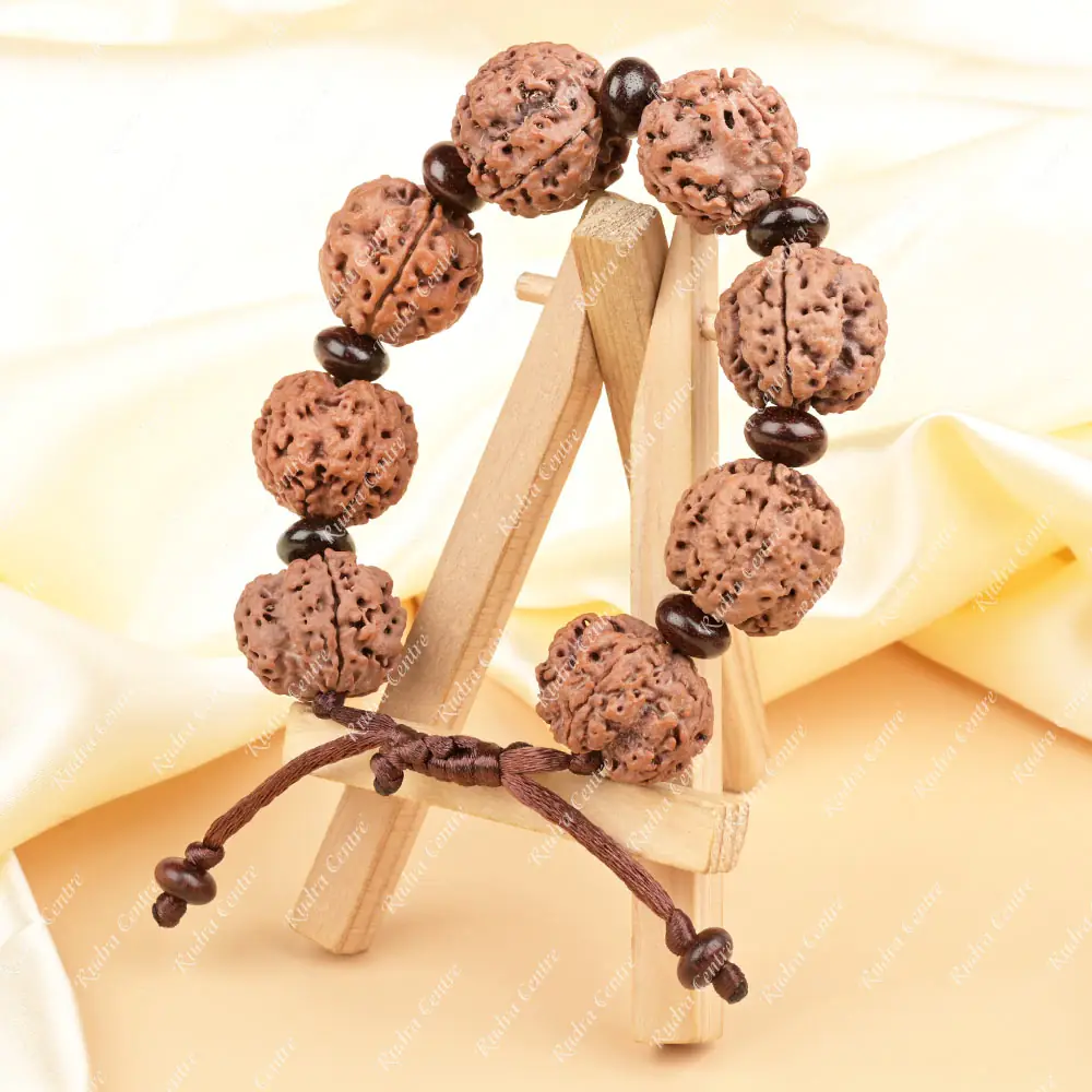 The bracelet standing on a small wooden easel