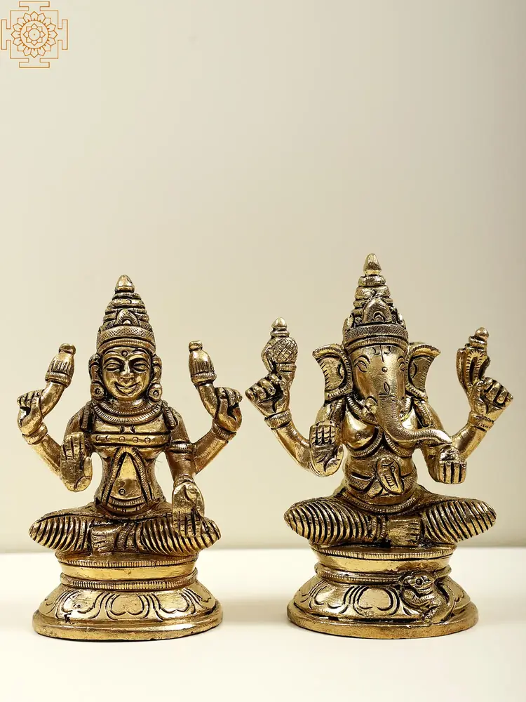 Lakshmi and Ganesha brass pair on pale ground