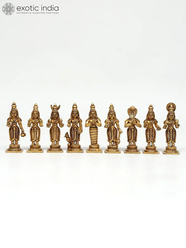 Nine standing brass figures in a row