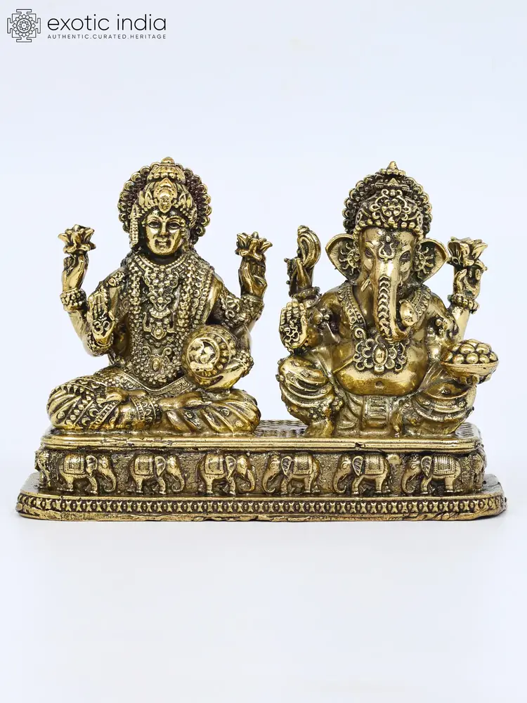 Lakshmi and Ganesha on a shared carved brass base