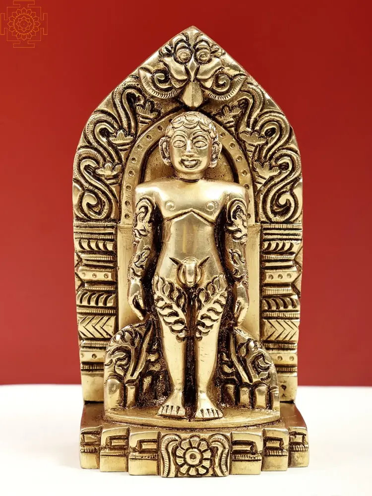 Brass Mahavira in an arched Kirtimukha frame, front view