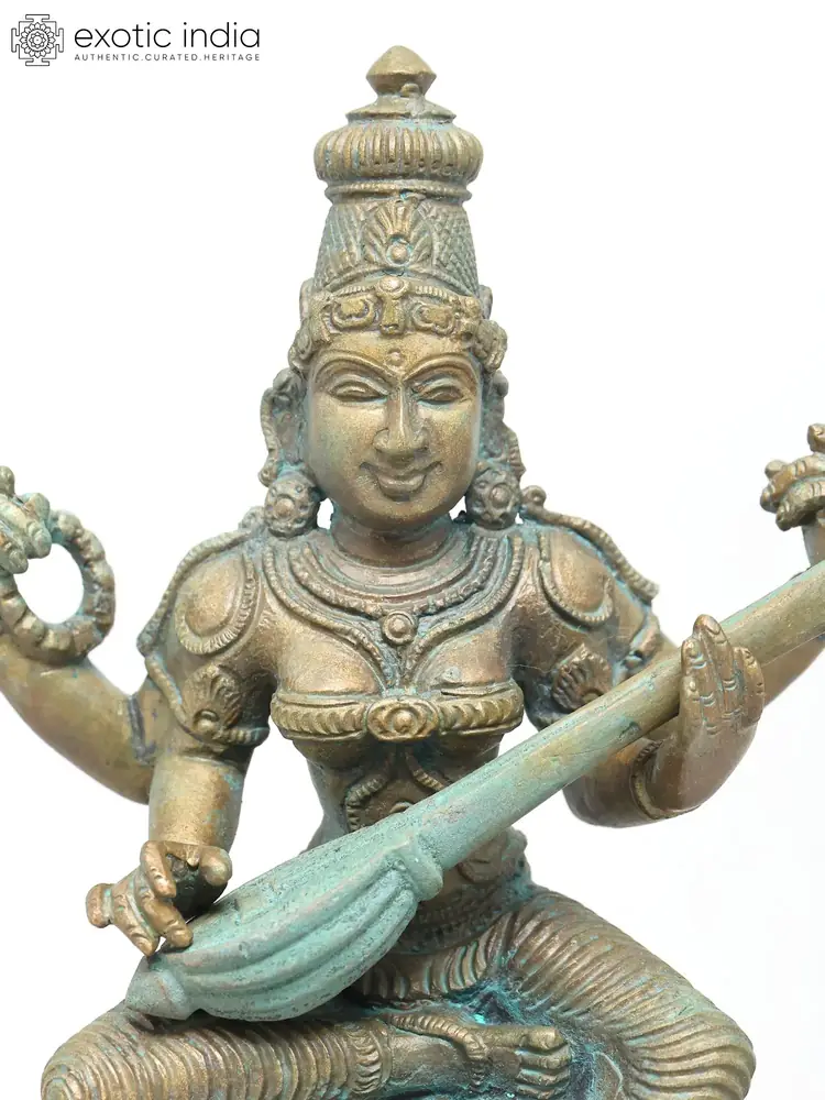Three-quarter view showing the face and veena
