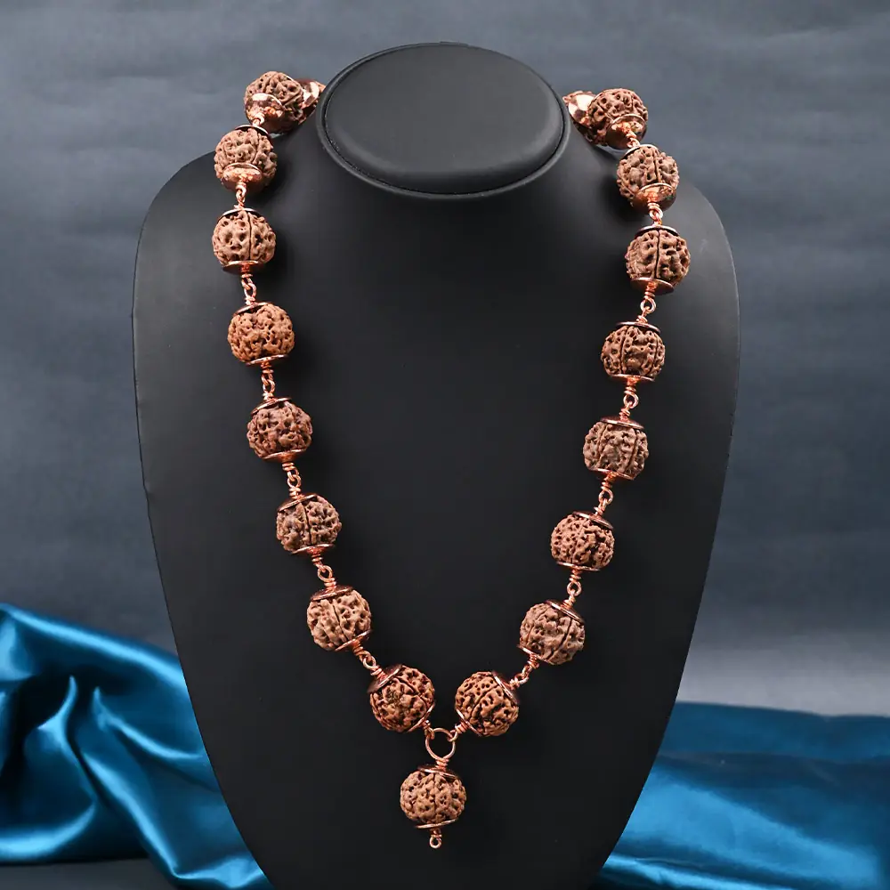 The mala worn on a neck display