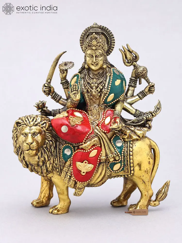 Brass Durga seated on a lion, front view