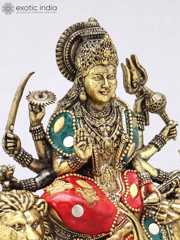 Close view of the goddess's face and arms