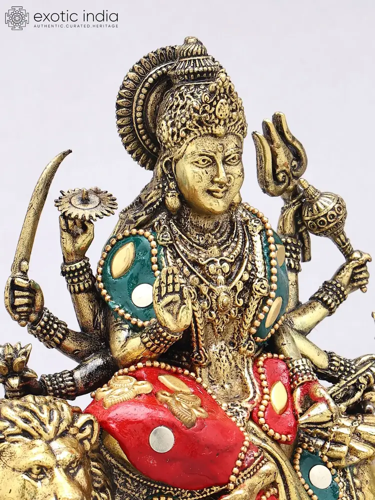 Close view of the goddess's face and arms