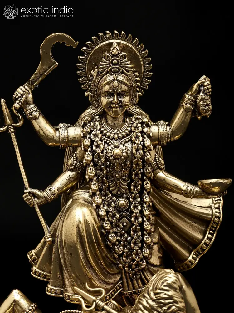 Close view of the goddess's face and garland