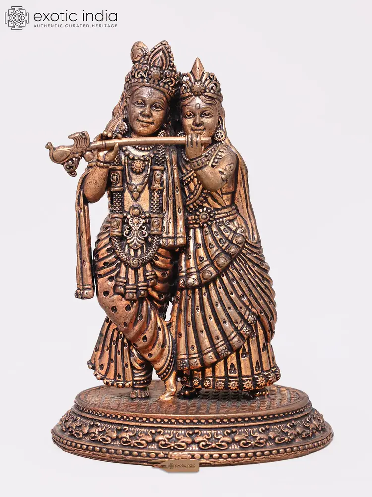 Brass Radha and Krishna on a round base, front view