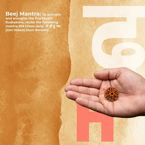A hand holding the bead