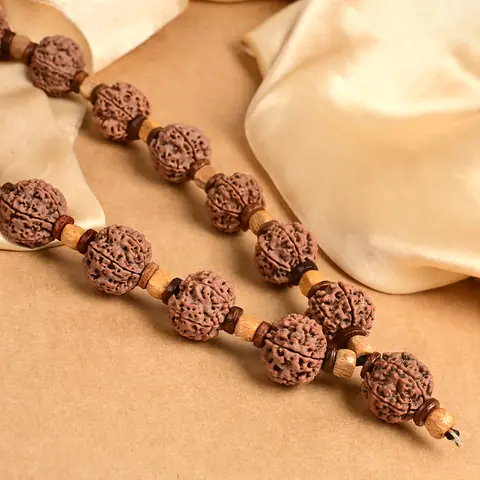 The mala stretched along the cloth