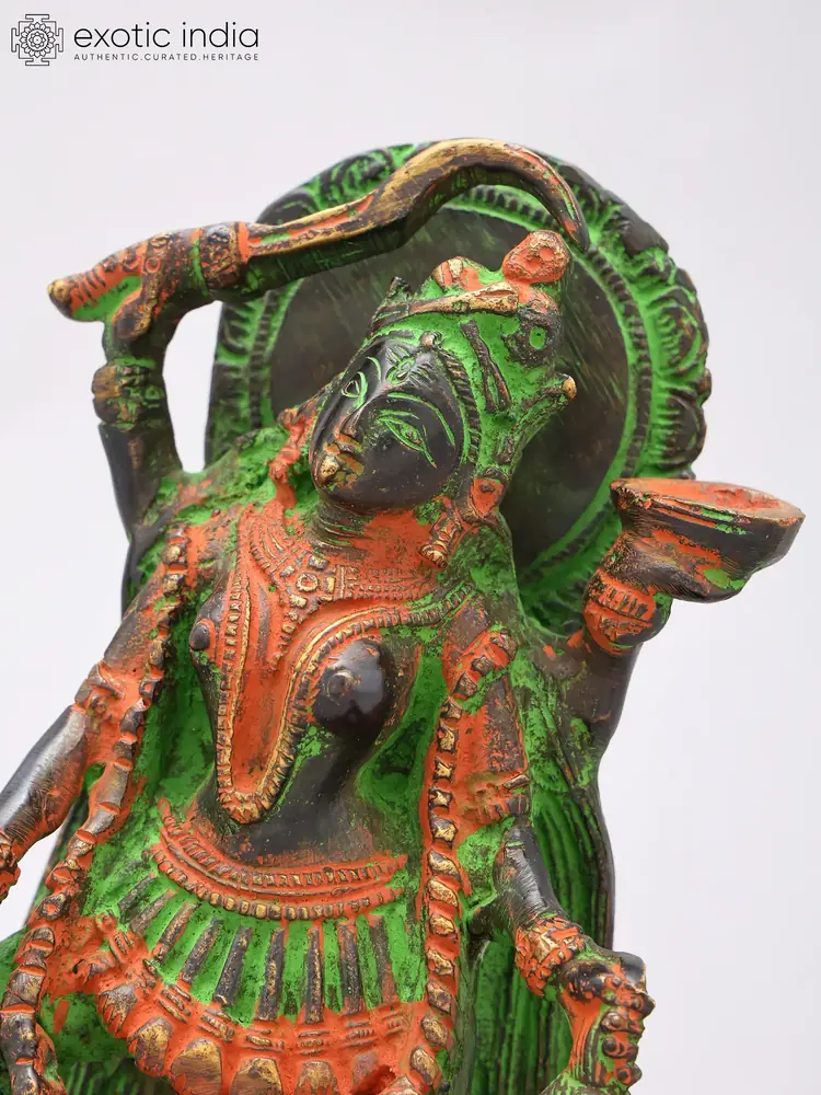 Close view of the goddess's upper body and arms