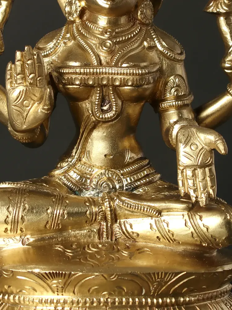 Close view of the hands and lap