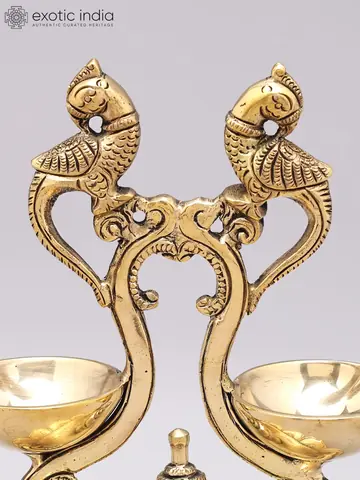 Side view of the parrots arching over the bowls