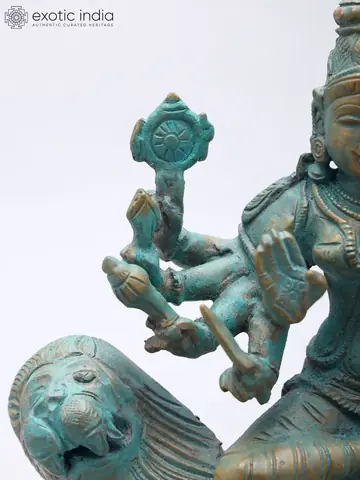 Side view of the goddess and lion