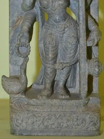 Close view of the lower body and base