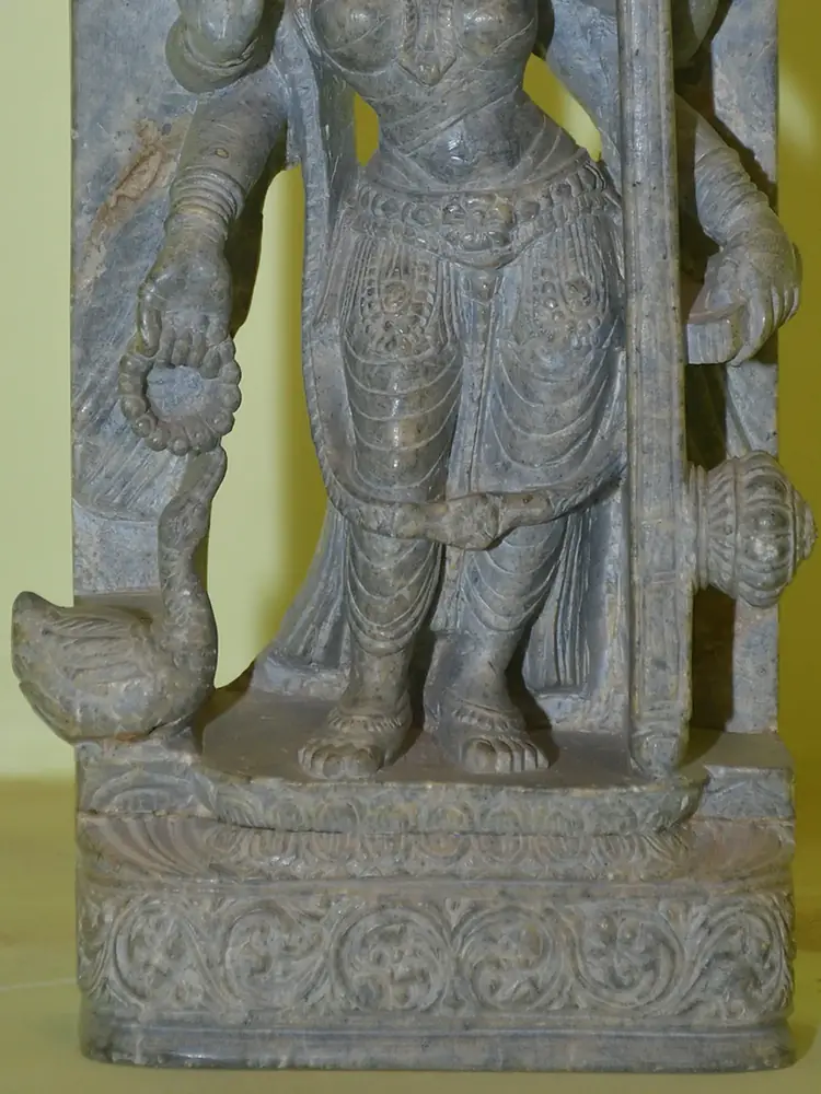 Close view of the lower body and base