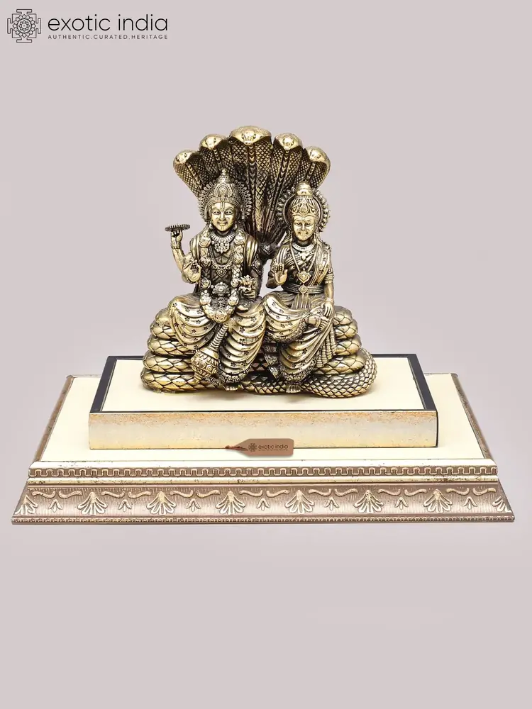 Brass Vishnu and Lakshmi on Sheshnag with the wooden base