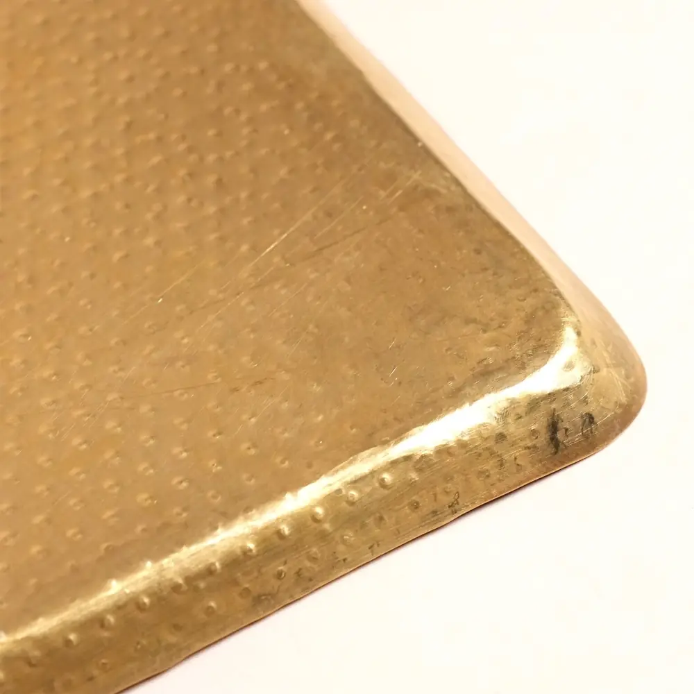 Close view of the dimpled surface and corner