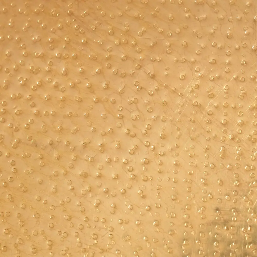 Close view of the hammered dimples