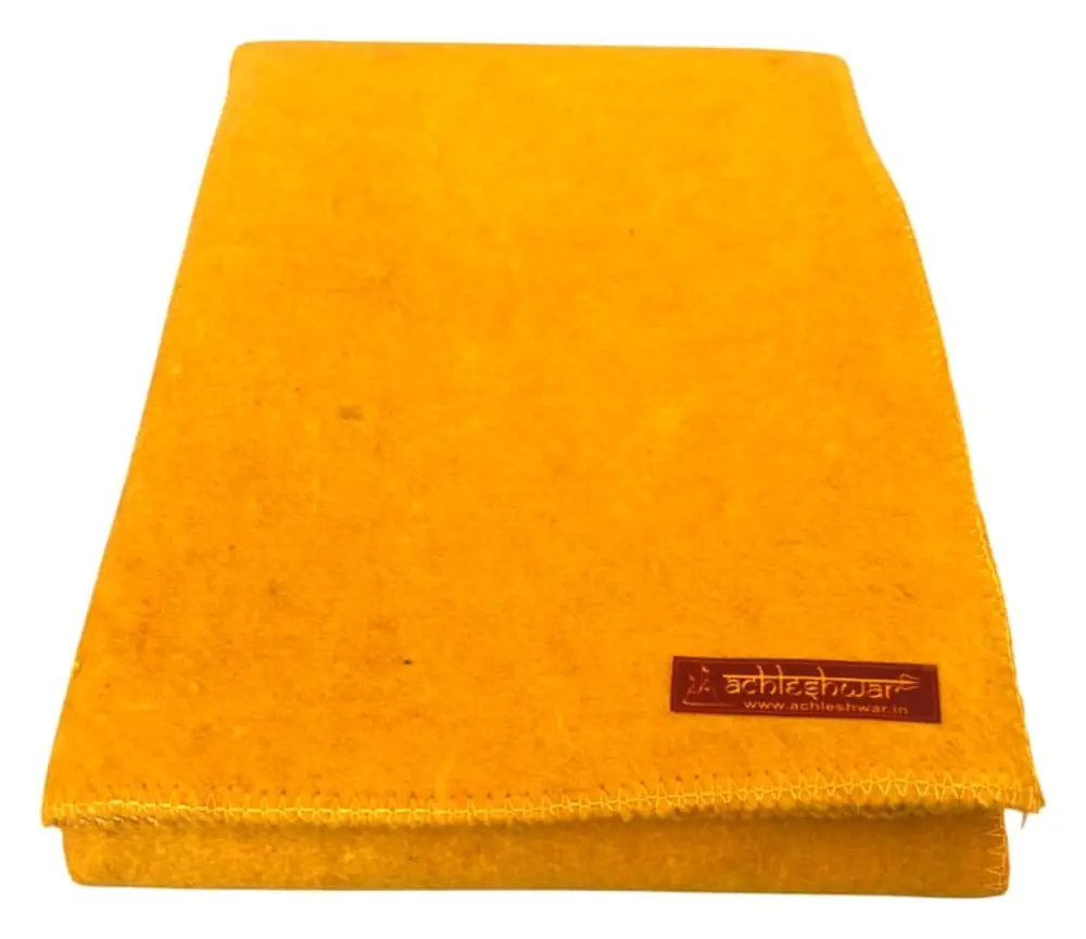 The yellow woollen asana folded