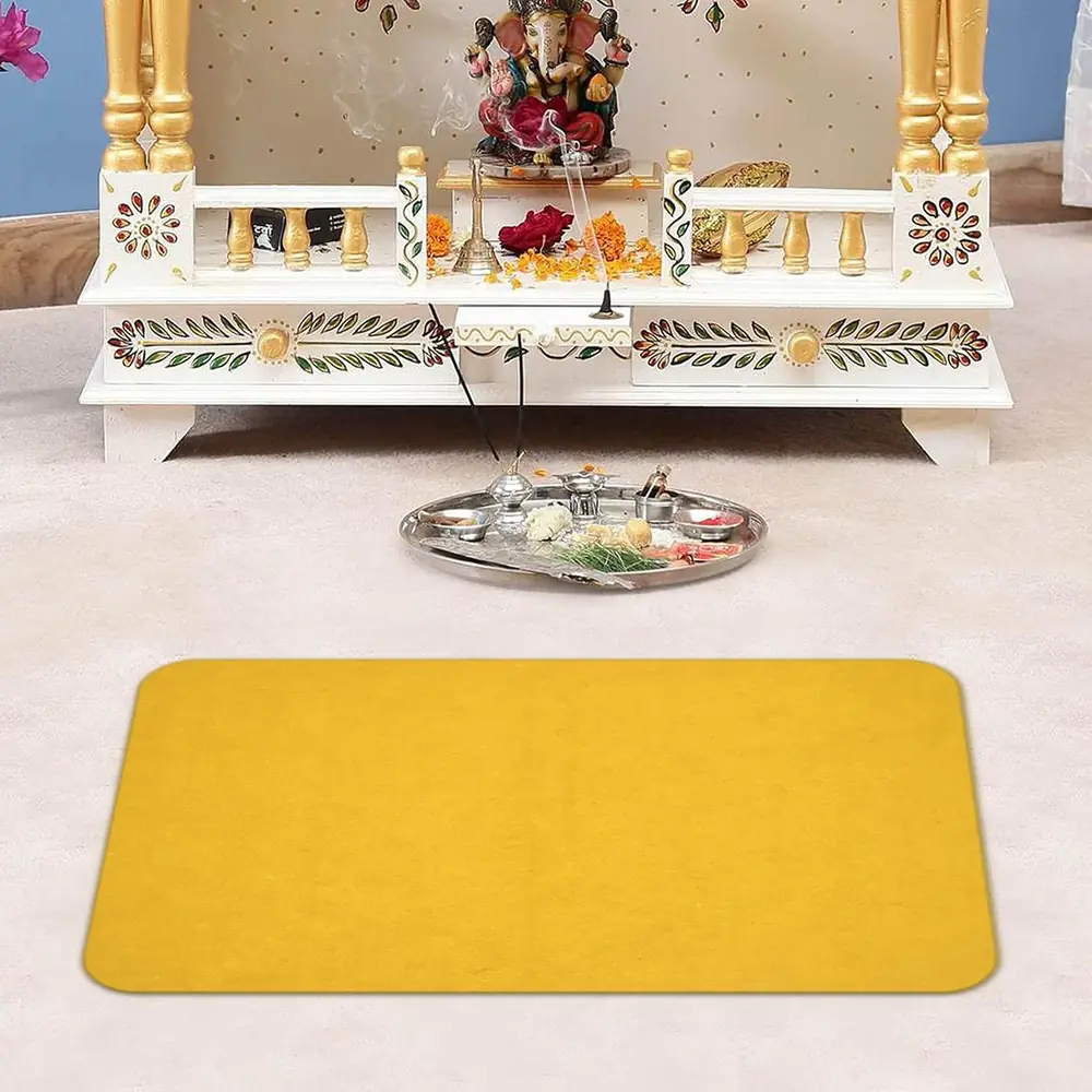 The asana laid in front of a home altar