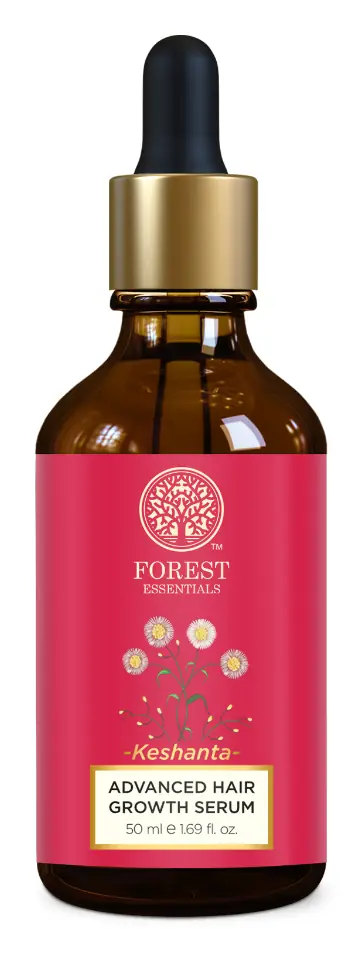 Amber dropper bottle of the hair serum with a red label