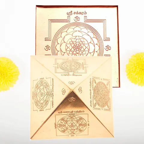 Copper sheet pieces with a Sri Yantra