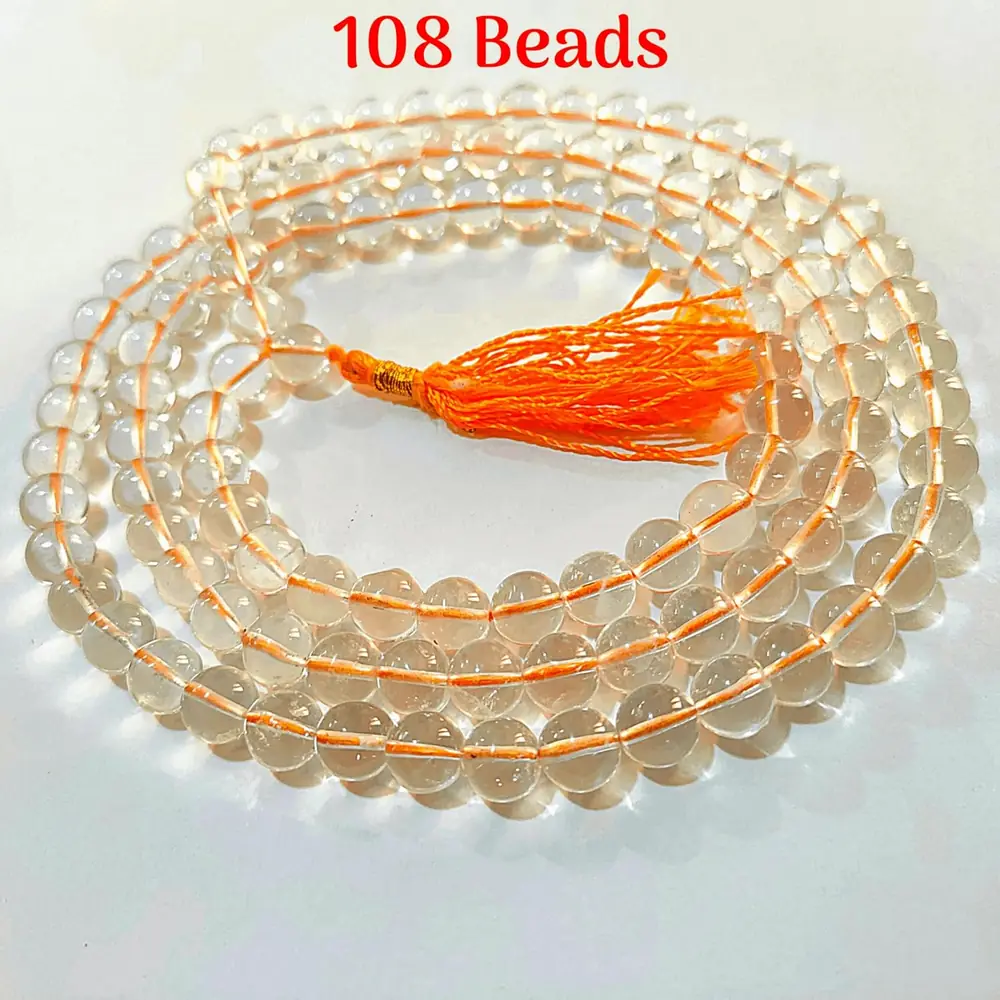 Close view of the beads on a pale ground