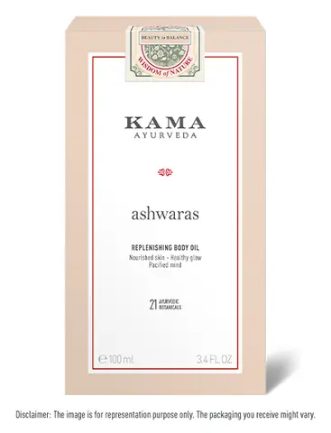 The pale carton for the Ashwaras replenishing body oil