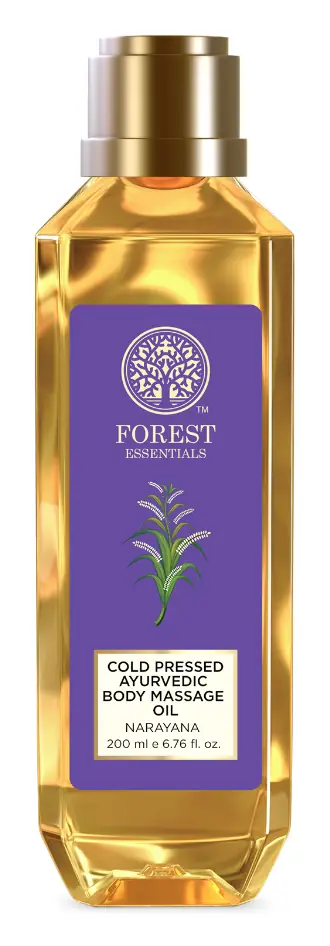 Bottle of Narayana body massage oil with a purple label