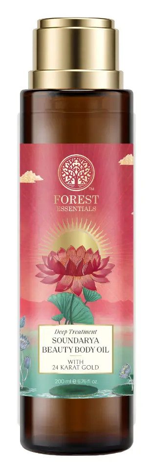 Bottle of Soundarya beauty body oil with a floral label