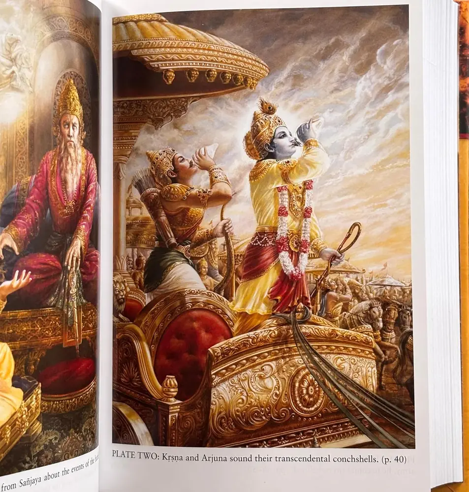 Inside spread showing a colour plate of Krishna and Arjuna