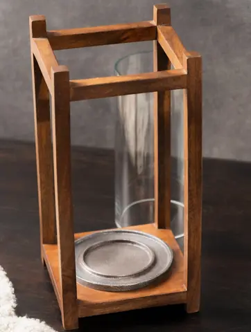 Empty lantern showing the glass cylinder and base tray